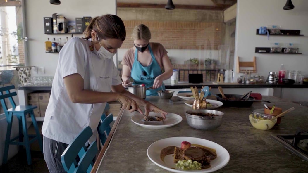 Rachel learns to cook Colombian food from a chef